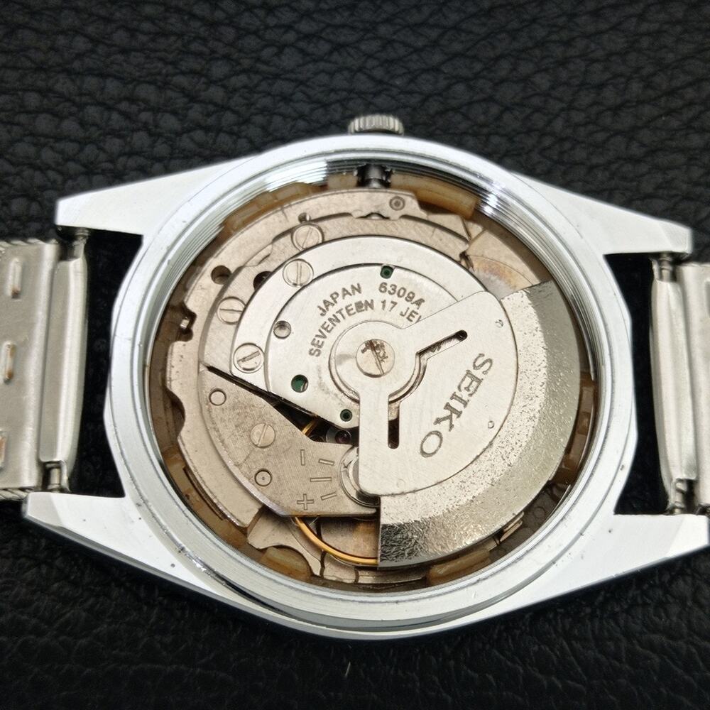 Vintage 1974 Disney Seiko Automatic Mens Silver Watch W/daydate & Donald accents - Picture 9 of 10